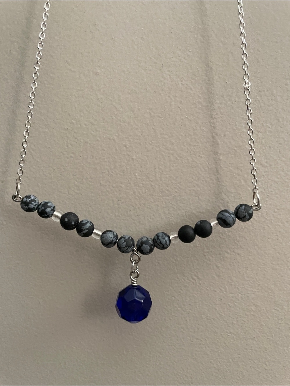 Delicate black snowflake obsidian round gemstones with blue glass wire Necklace.